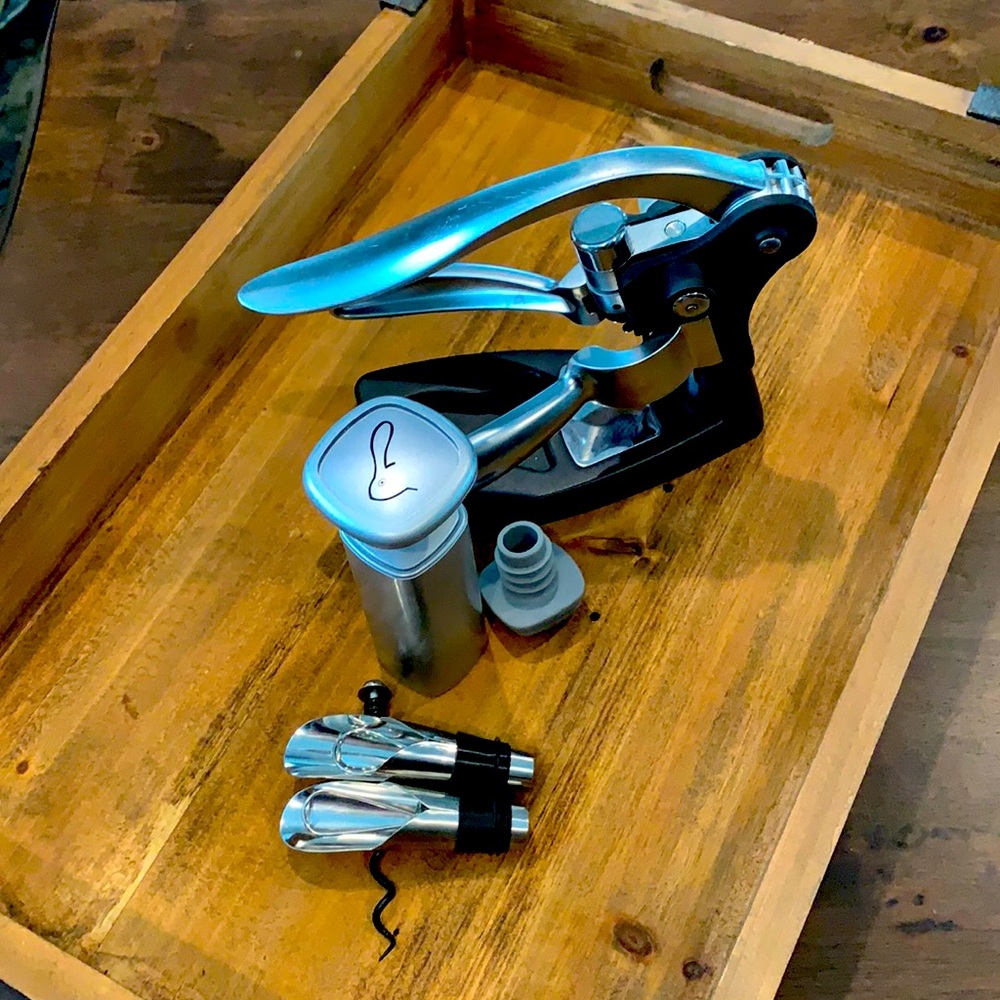 Wine opener, and vacuum stop